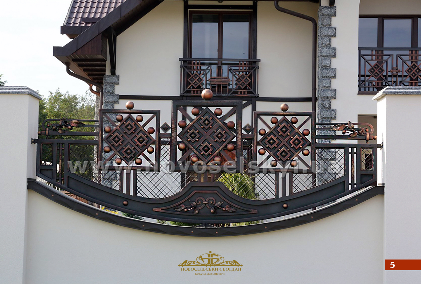 Metal fence with forged elements