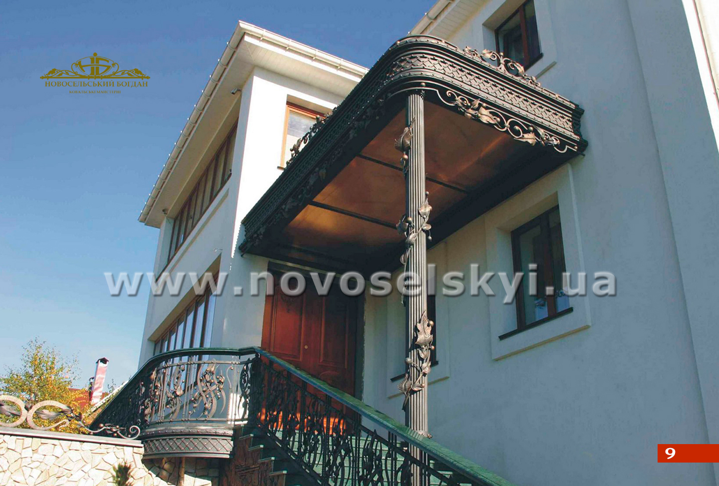 Wrought iron canopy above the entrance door with columns